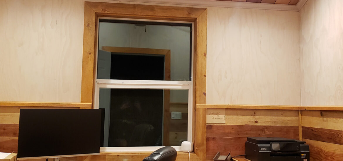 Custom window replacement project in Coeur d'Alene ID with timber interior and exterior trim designed to match the home's existing style