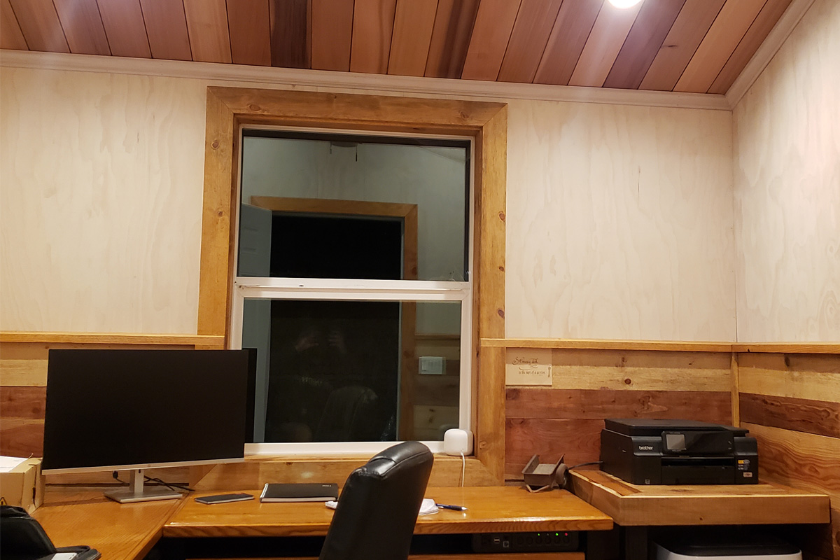 Custom window replacement project in Coeur d'Alene ID with timber interior and exterior trim designed to match the home's existing style